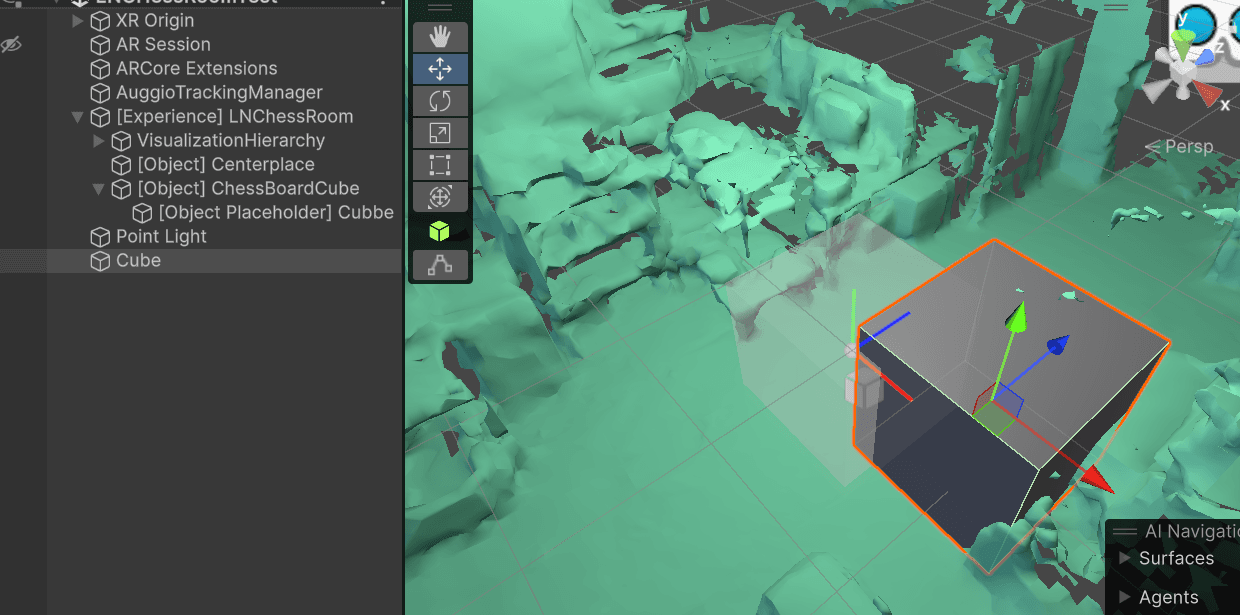 Unity hierarchy showing the LiDAR-scanned office mesh with a placeholder cube anchored for testing the AR tracking setup